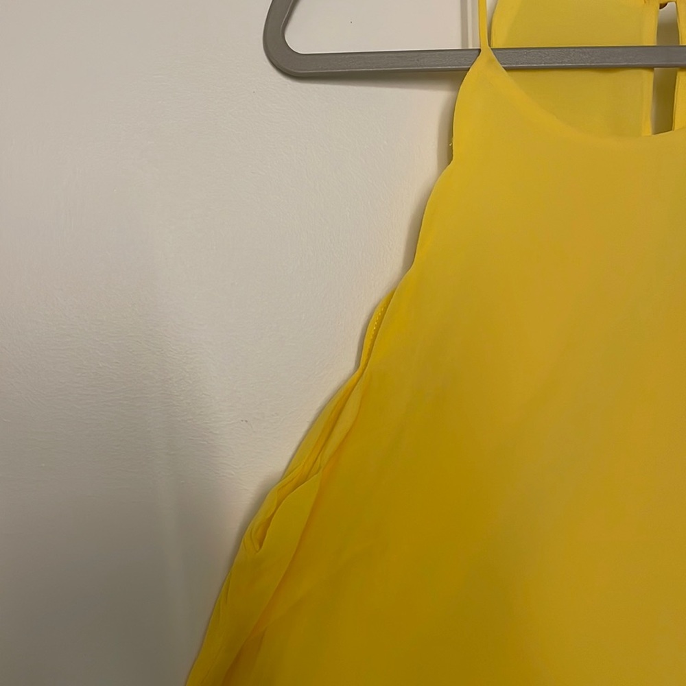 Yellow tank with gold ball clasp! Never worn. Scalloped details.